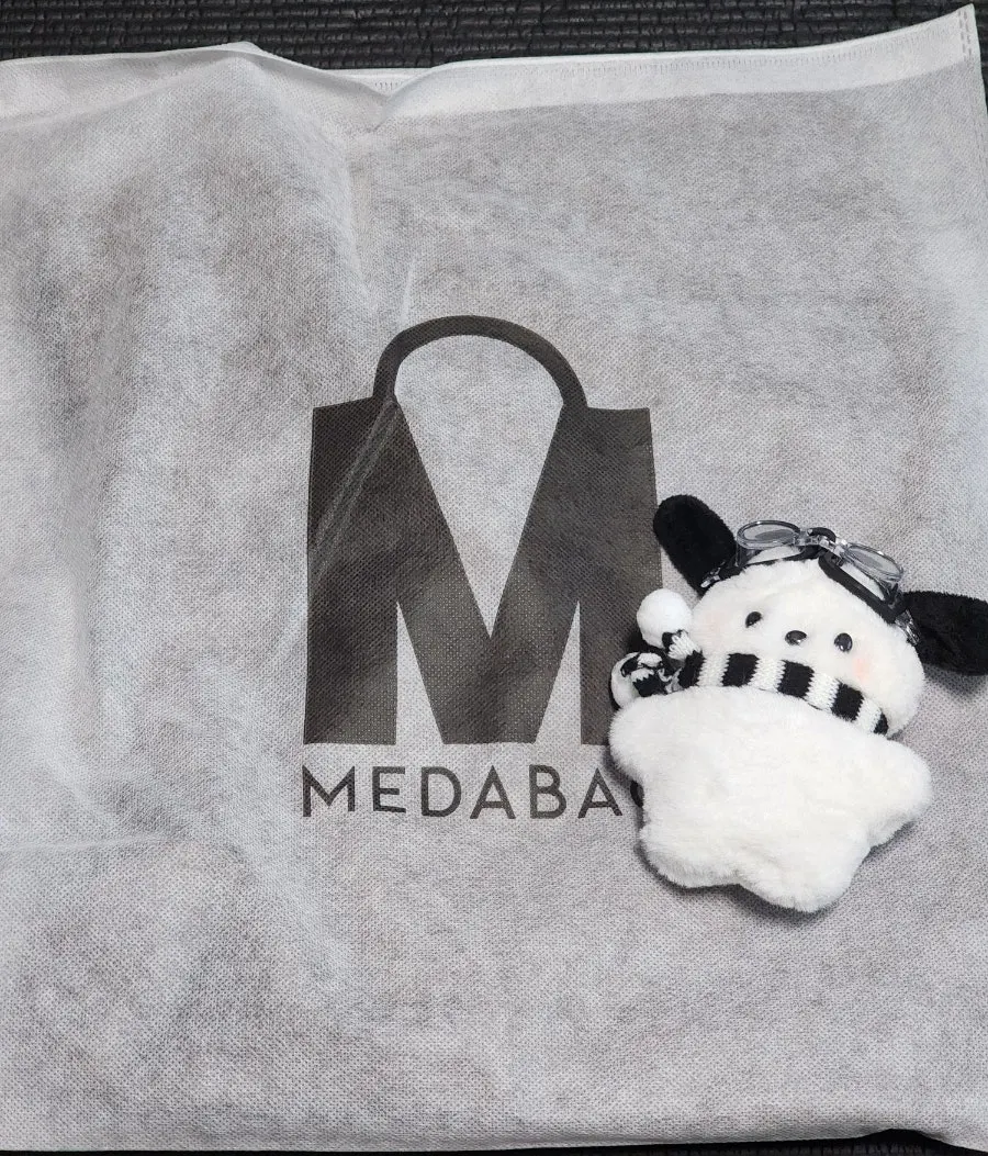 Meda Bag Suede Shoulder Bag in the chosen camel color