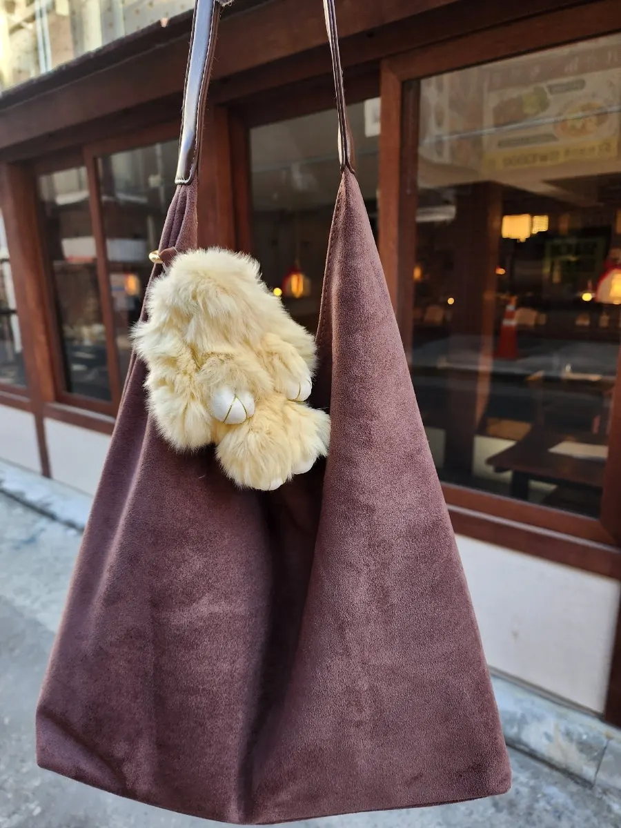Meda Bag Suede Shoulder Bag paired with an everyday outfit