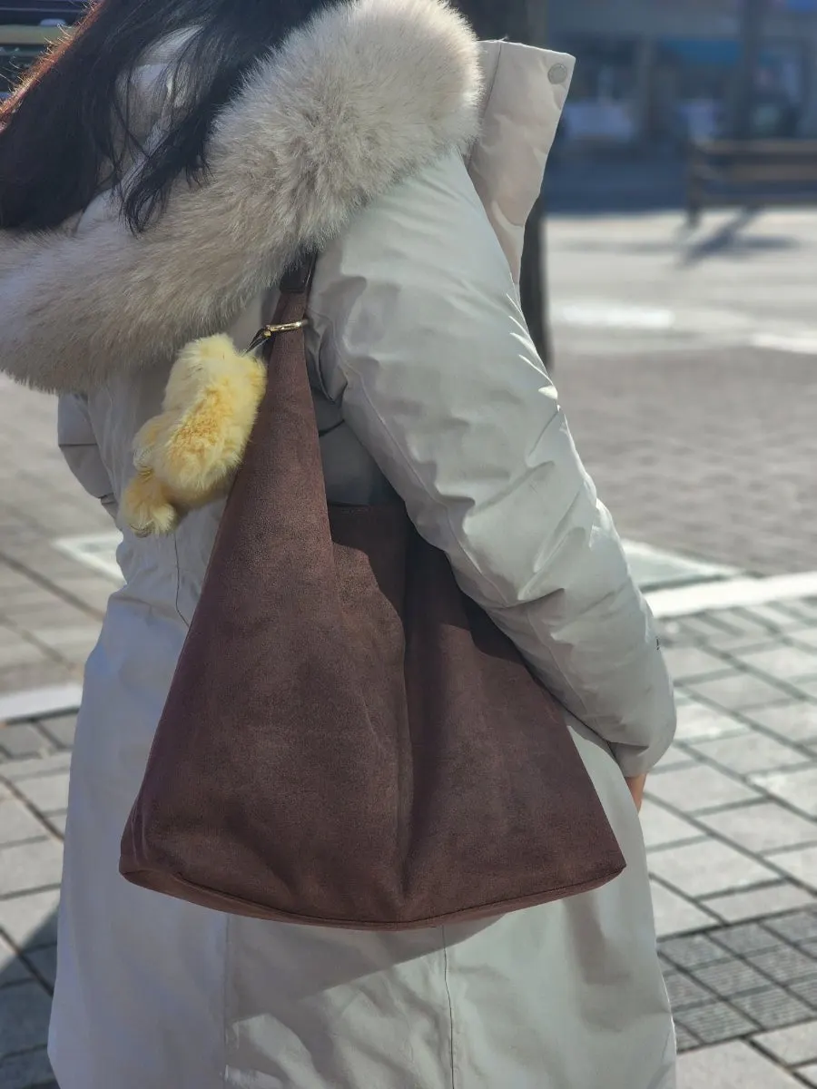 Meda Bag shoulder bag accented with a rabbit character keyring