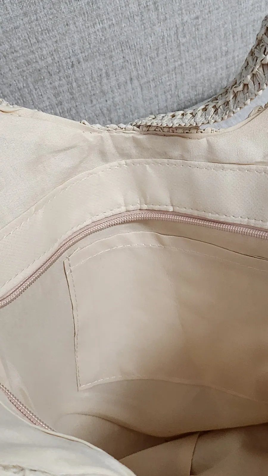 Interior storage and inner pouch of the Meda Bag rattan bag