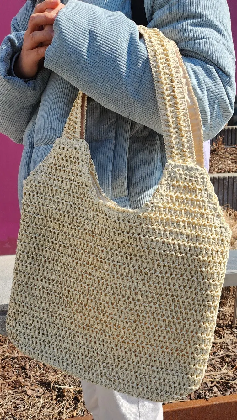 Meda Bag rattan bag used as a secondary bag with a mini backpack