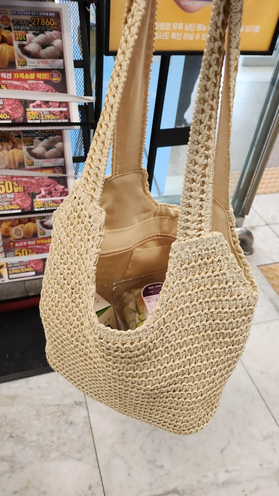 Meda Bag rattan bag filled with grocery items