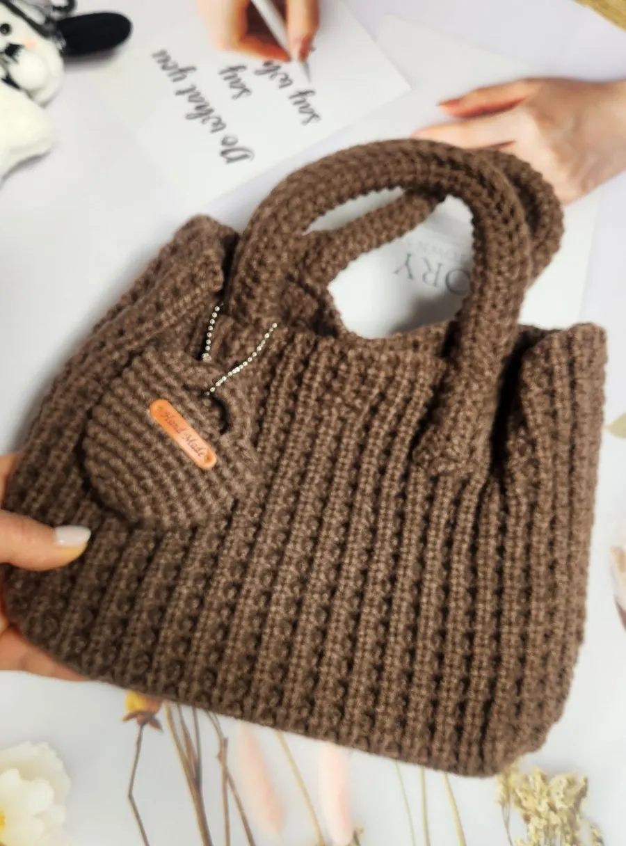 Carrying a knit tote bag on an outing