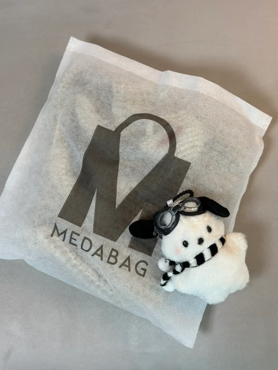 Wearing a knit mini tote bag for winter