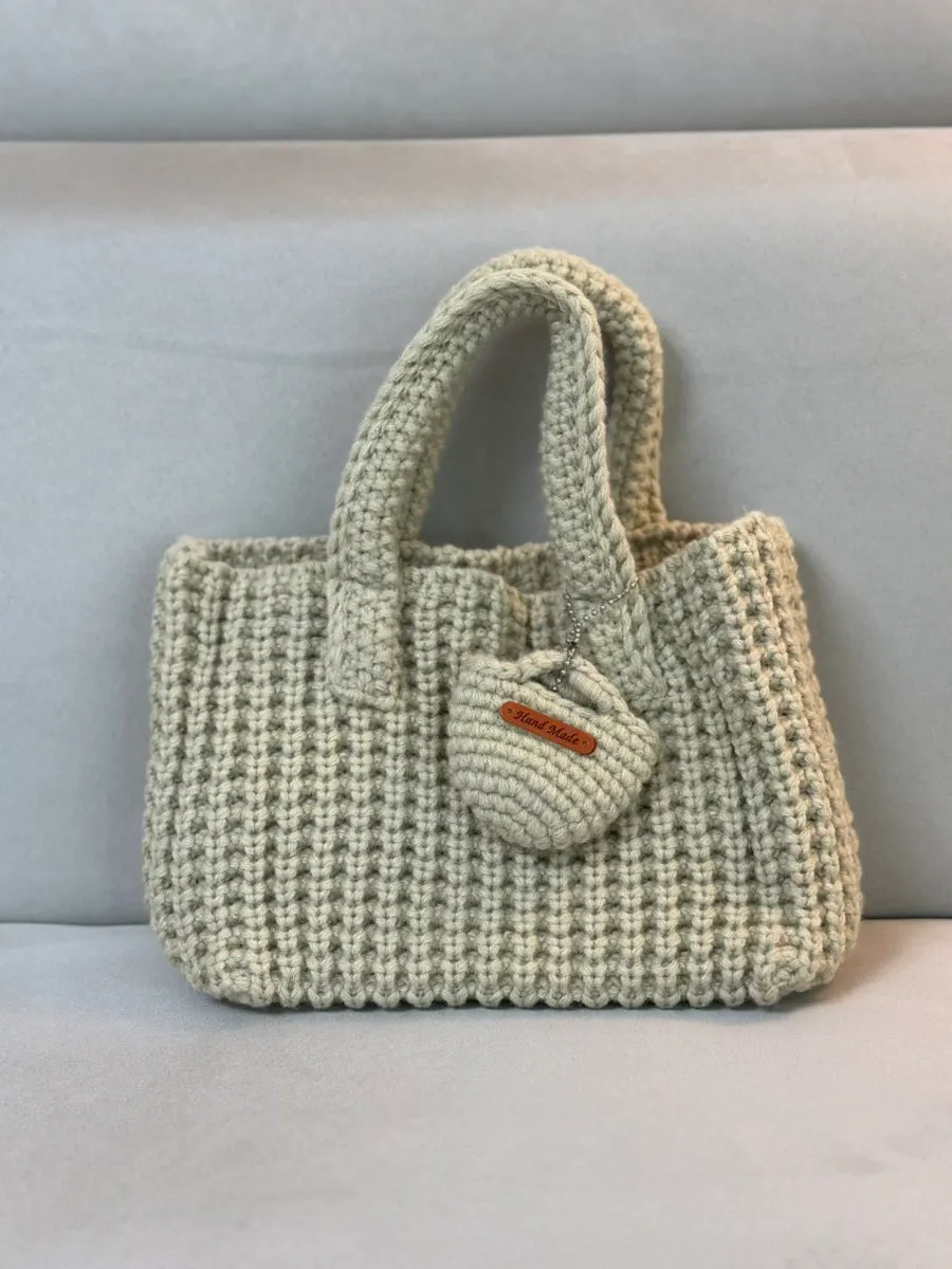 Knit bag base support structure