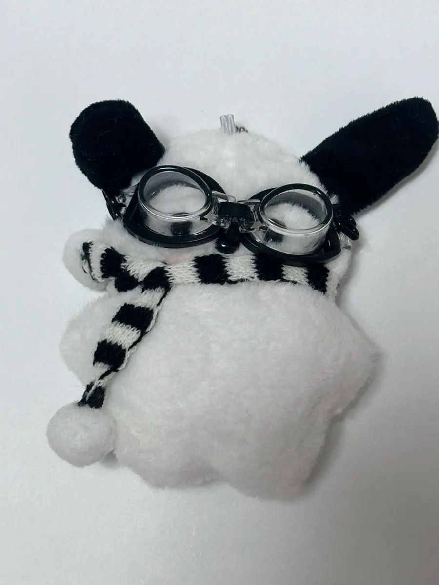 Knit mini tote bag holding personal items