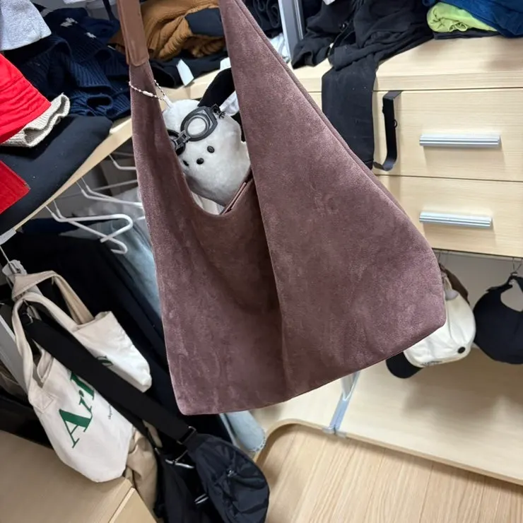 A suede bag used often during winter
