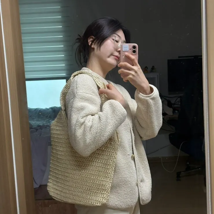 A light-toned outfit worn while taking the twins for vaccinations