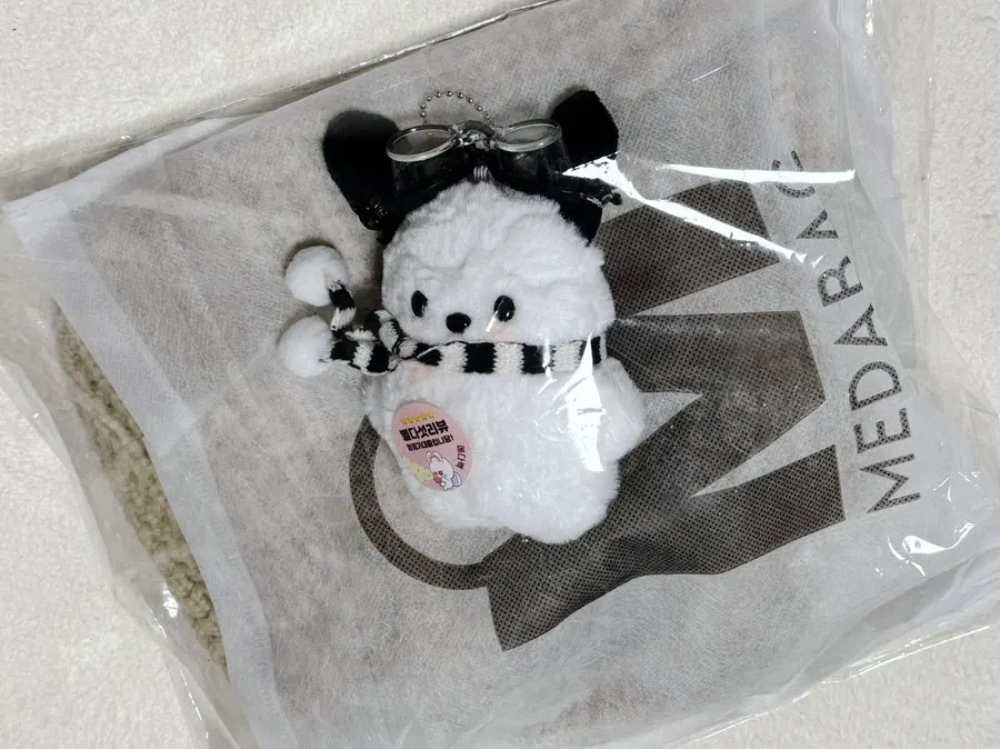 Knit bag and keyring arriving with packaging