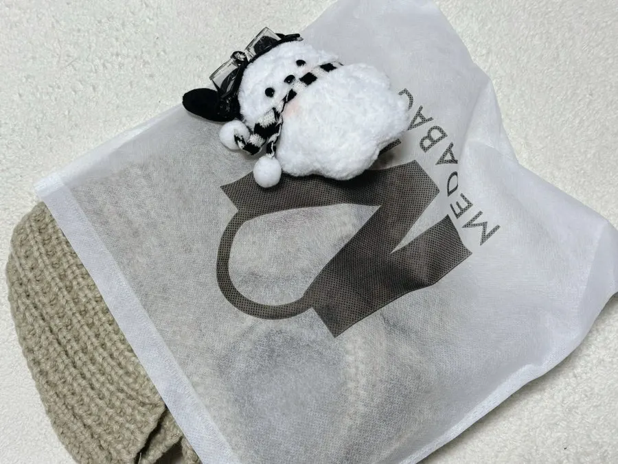 Delivered mini knit dot bag