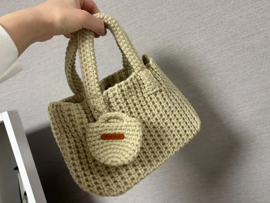 Knit dot bag with a front pocket