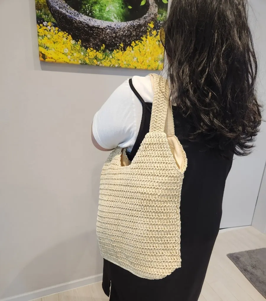 Rattan travel bag to pair with a dress