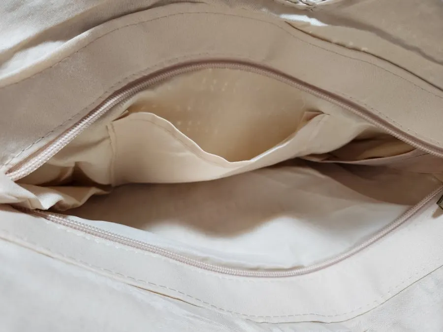 Wide interior and small pocket inside the rattan bag
