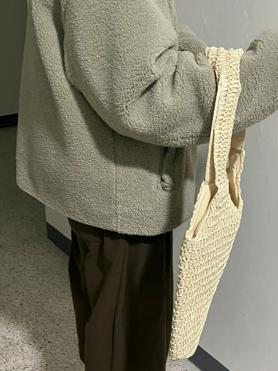 Rattan-style bag with everyday storage examined