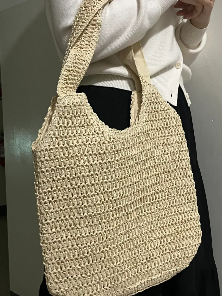 Rattan-style bag styled with a padded jacket or coat