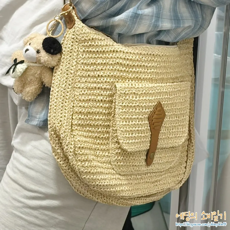 Meda rattan bag worn lightly while on the move