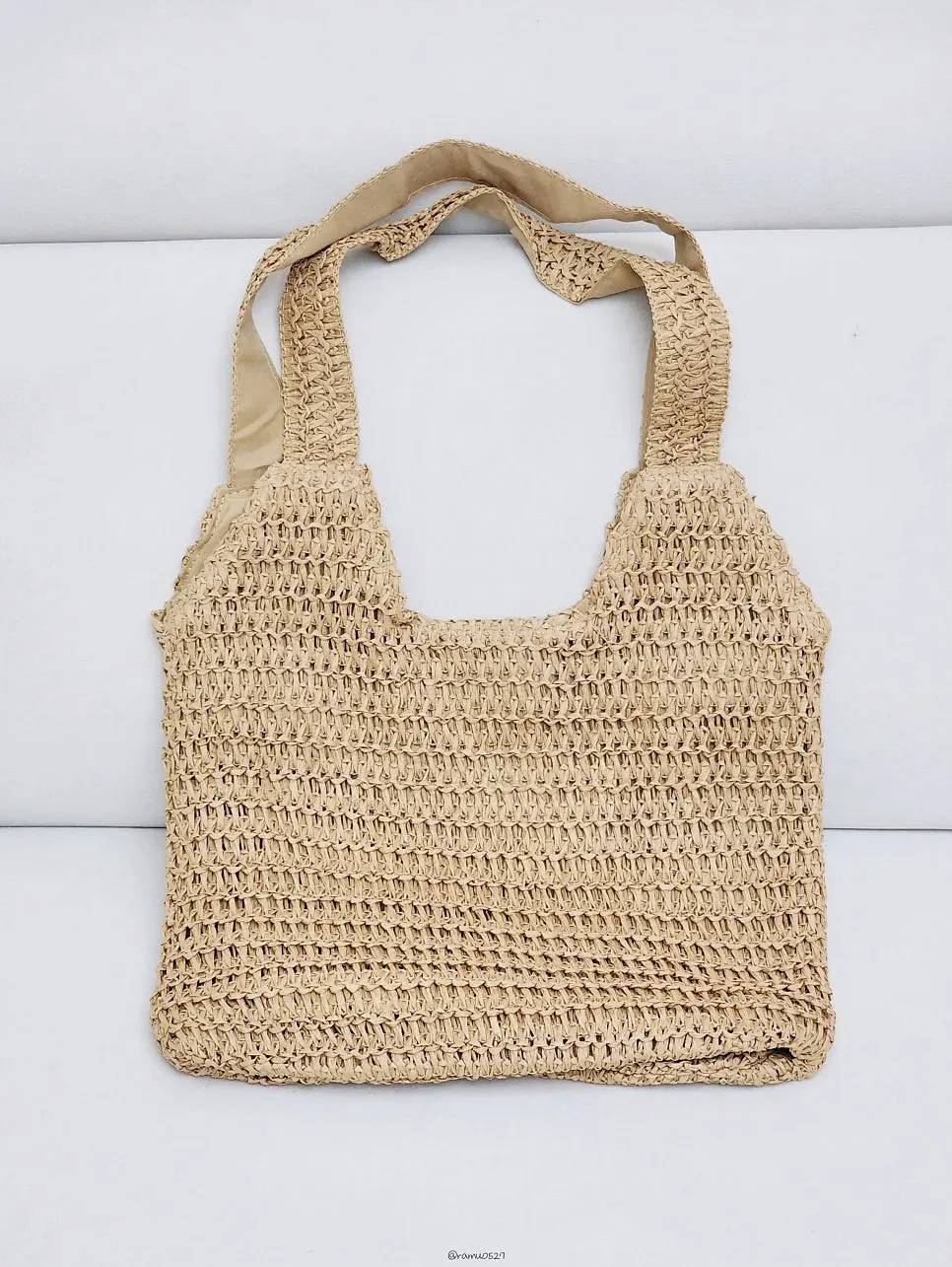 Brown color and exterior of the Meda Bag rattan bag