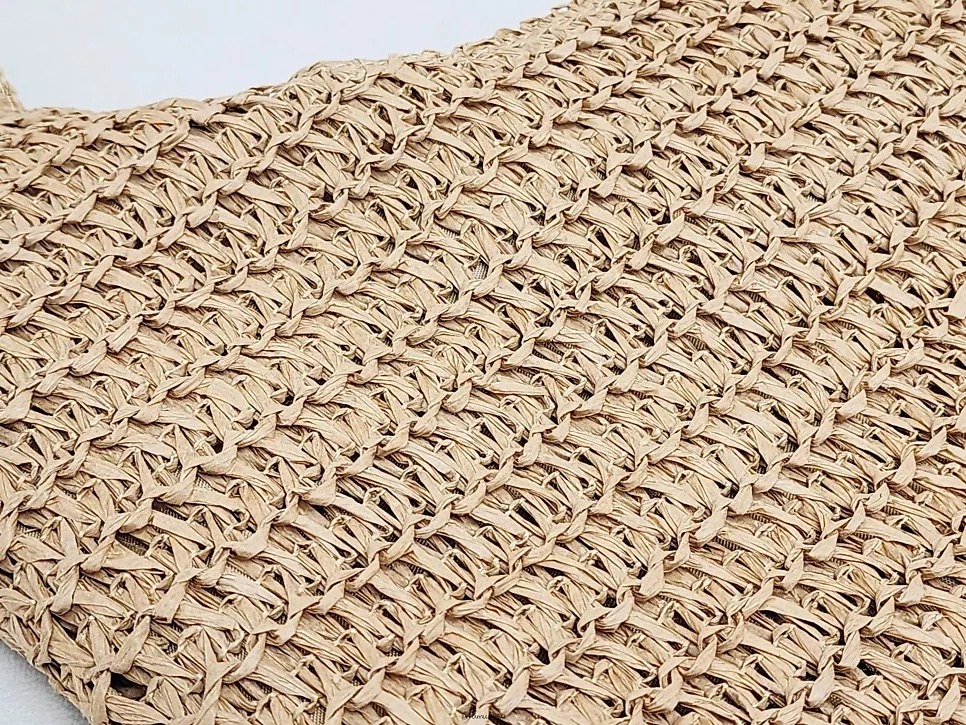 Material detail of the brown Meda Bag rattan bag