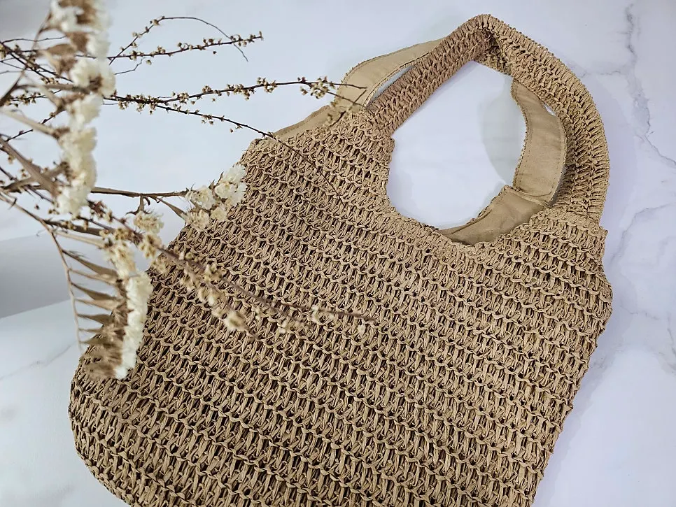 Meda Bag rattan shoulder bag photographed on a trip
