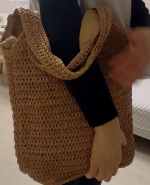 Meda Bag woven bag packed with an iPad and pouch
