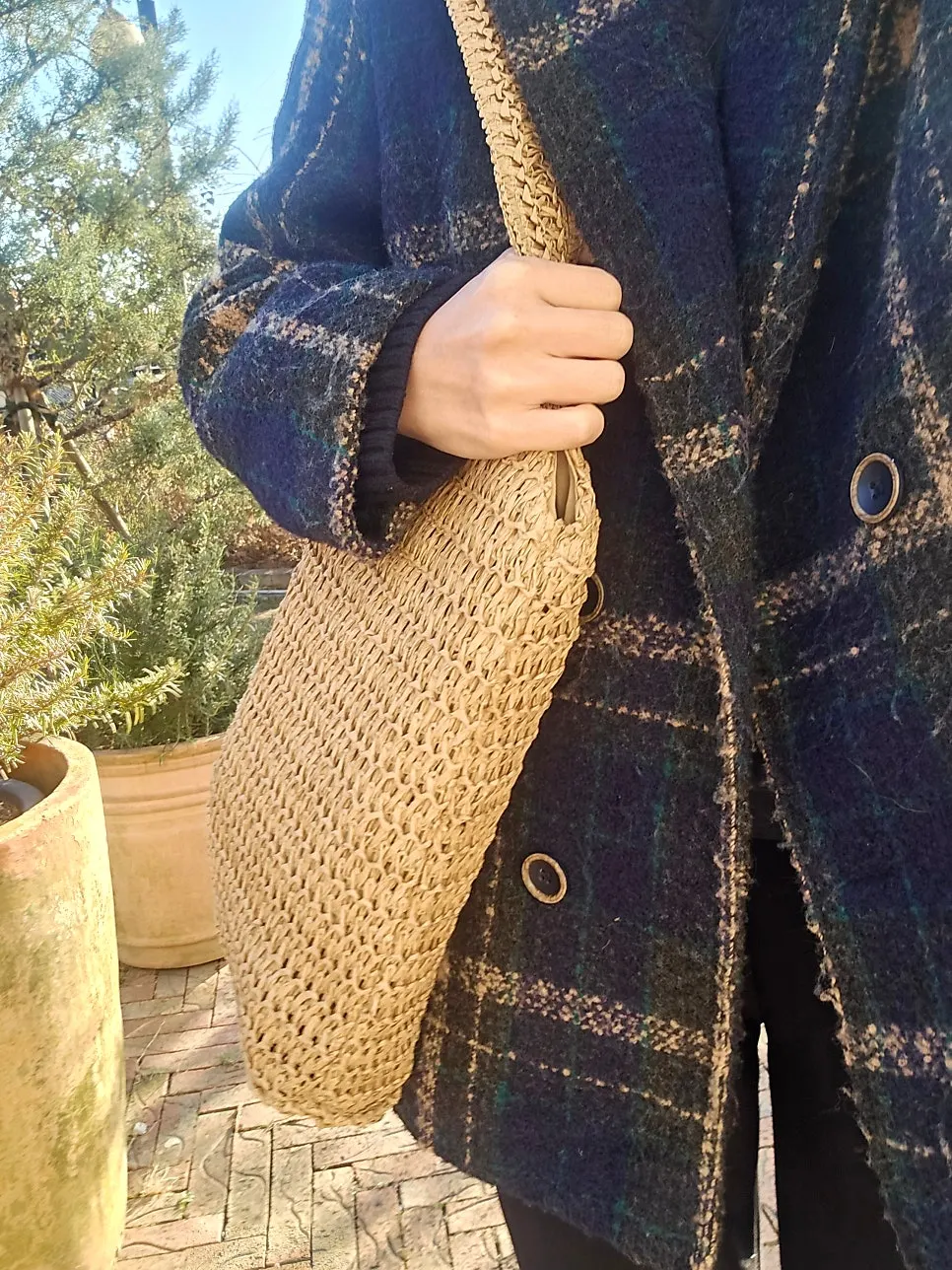 Brown rattan shoulder bag used on a West Sea trip