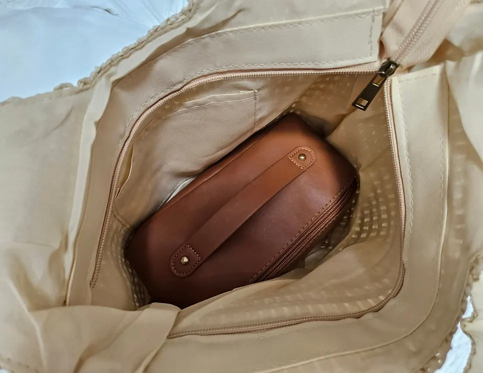 Large pouch placed inside the rattan bag