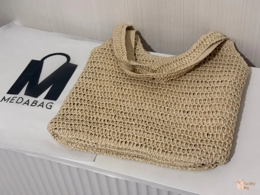 Dust bag and plastic wrapping for the Meda Bag rattan bag