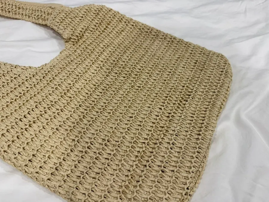 Travel-ready style of the Meda Bag rattan bag