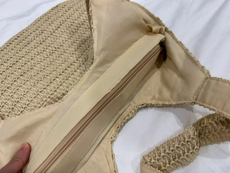 Rattan bag showing storage for personal belongings