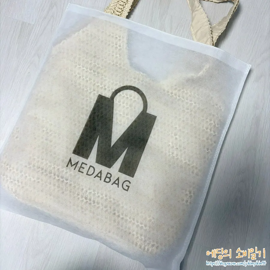 Meda Bag rattan bag holding plenty of travel essentials