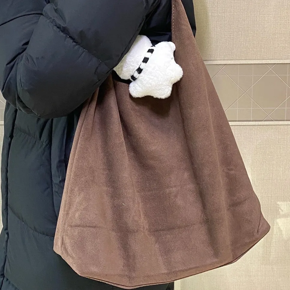 Meda Bag shoulder bag styled with a doll keyring