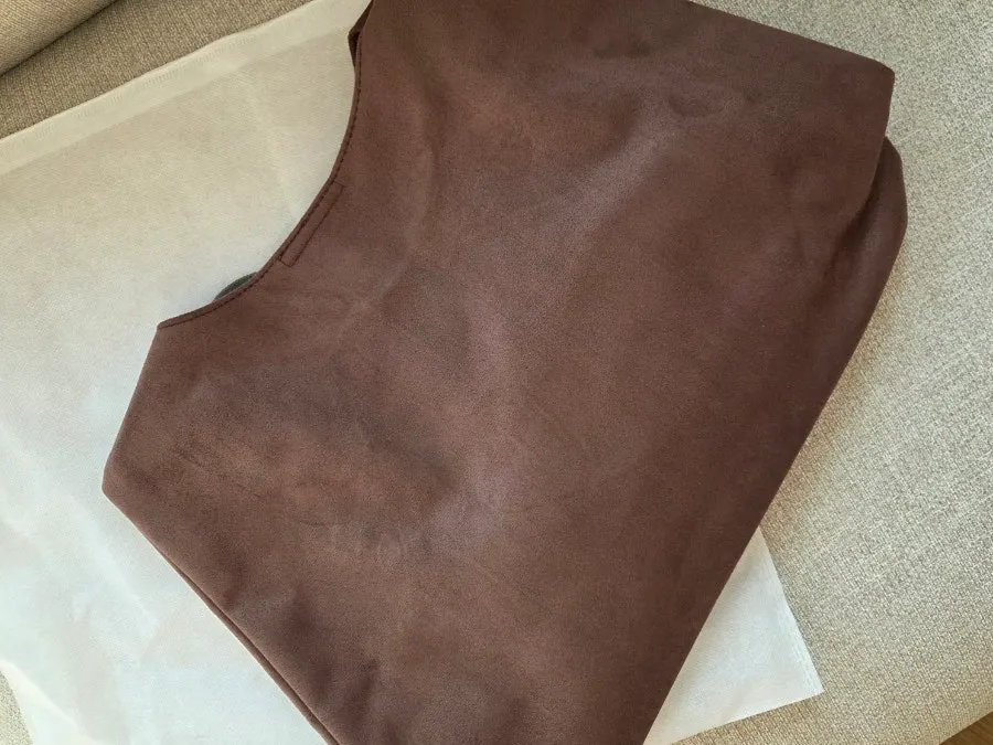 Soft suede texture of the Meda Bag hobo bag