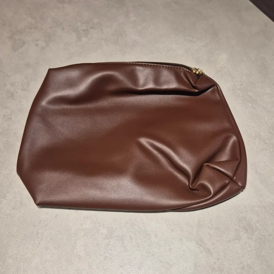 Dog doll received together with the Meda Bag shoulder bag
