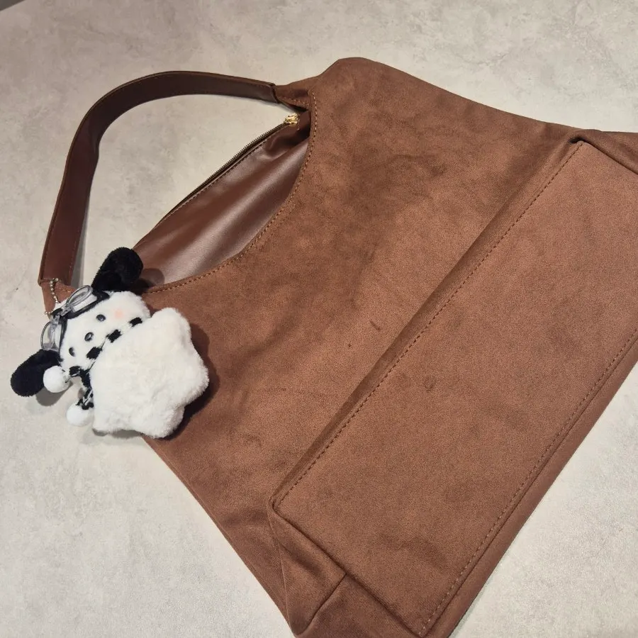 Mini pouch included with the Meda Bag shoulder bag