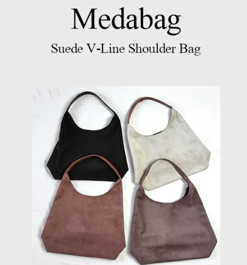 Meda Bag suede bag chosen for its roomy storage