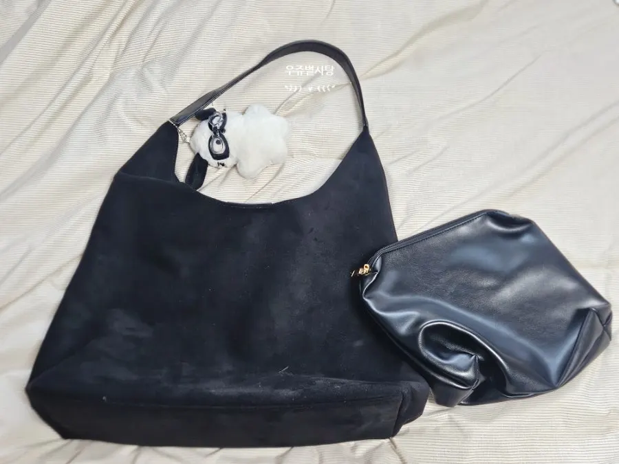 Opening and interior space of the Meda Bag Suede Shoulder Bag
