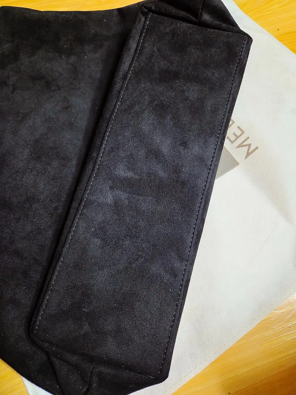 Meda Bag suede shoulder bag worn for commuting