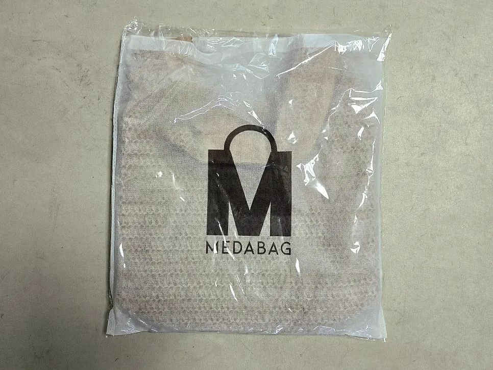 Meda Bag summer bag with a paper-yarn crochet texture