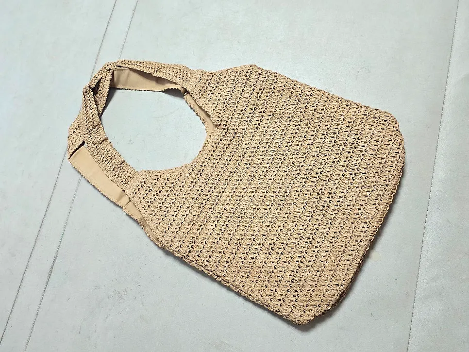 Meda Bag rattan-style bag delivered inside a pouch