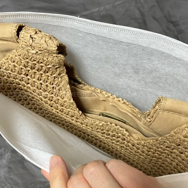 Rattan bag in its dedicated dust bag