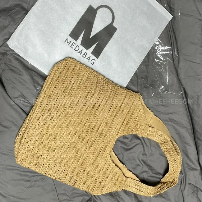 Dedicated dust bag included with the rattan bag