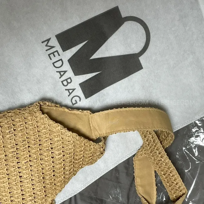 Rattan bag in a mid-tone brown color