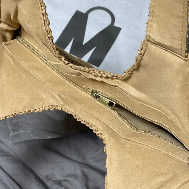 Bag detail showing the tight rattan weave