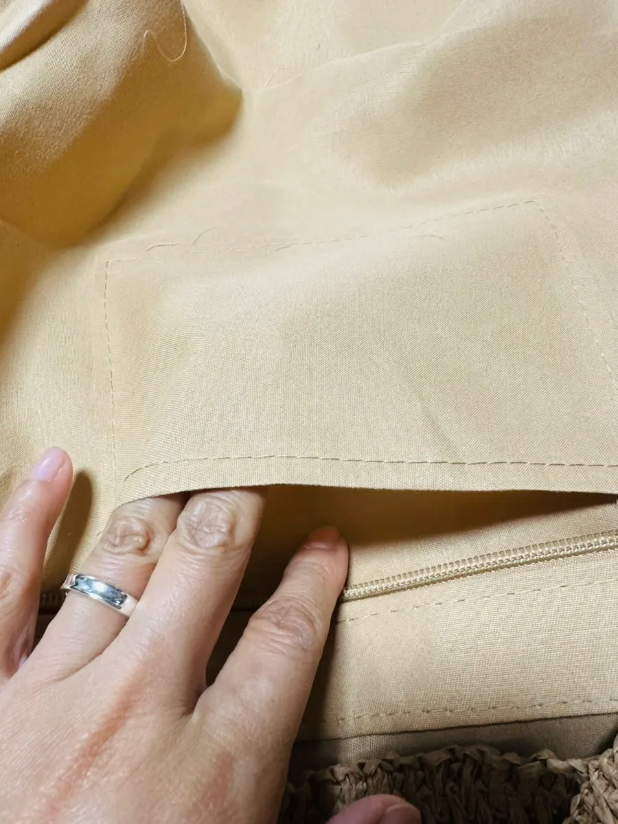 Inside the rattan bag with its zipper