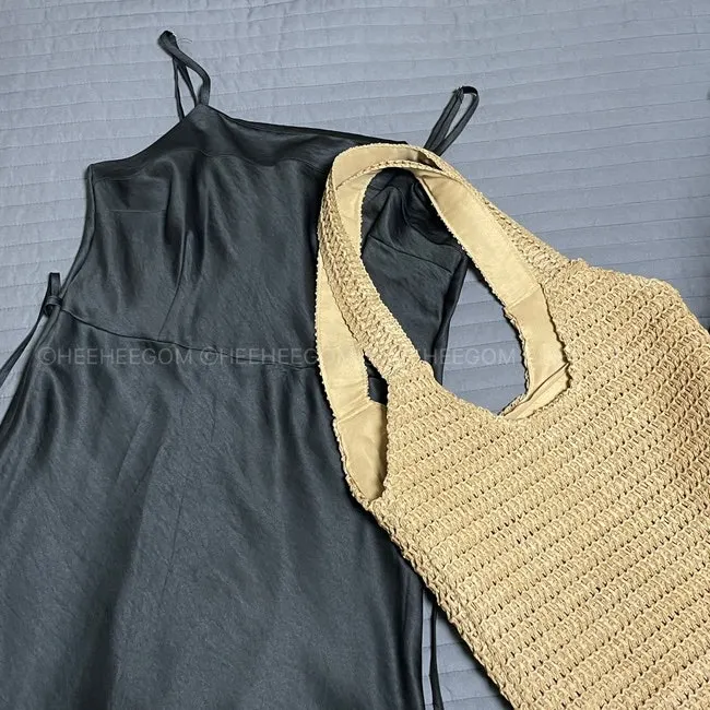 Rattan shoulder bag paired with a summer dress
