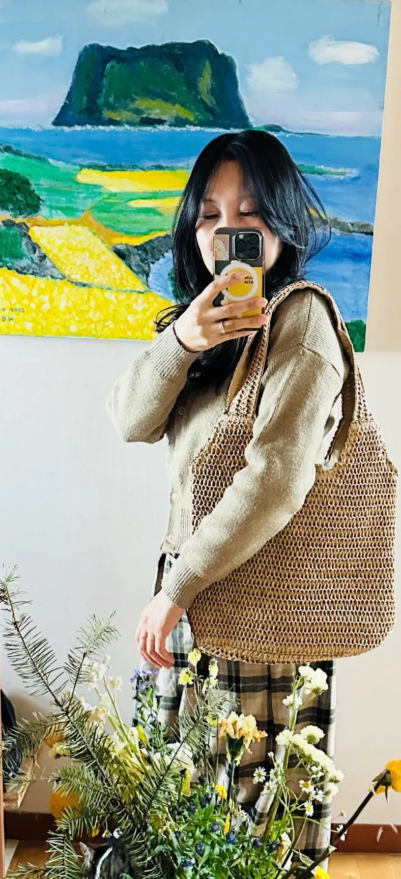 Rattan shoulder bag paired with an outfit