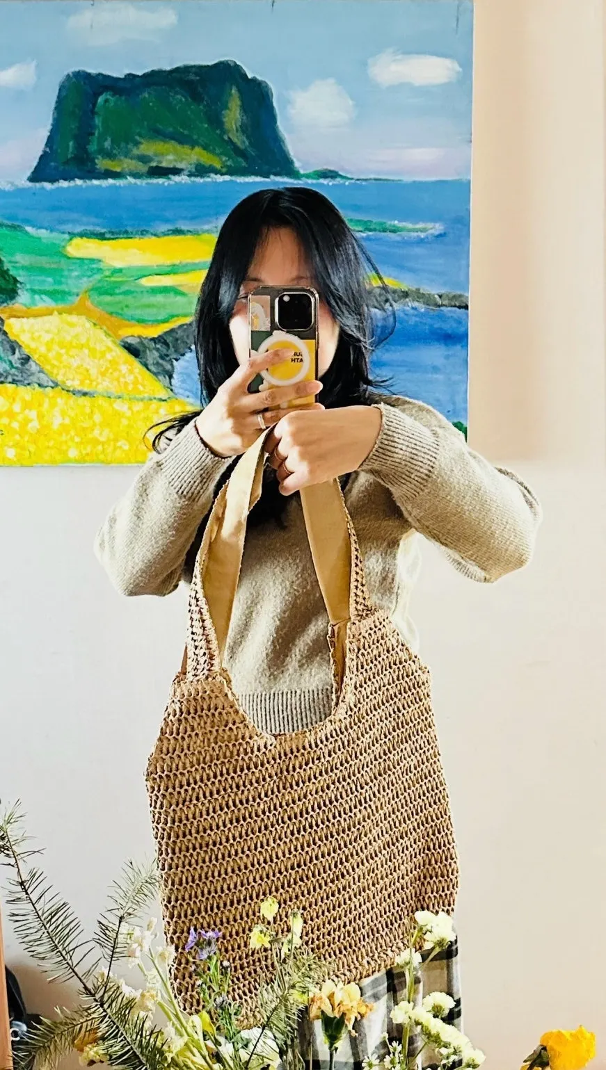 Rattan bag styled with a winter outfit