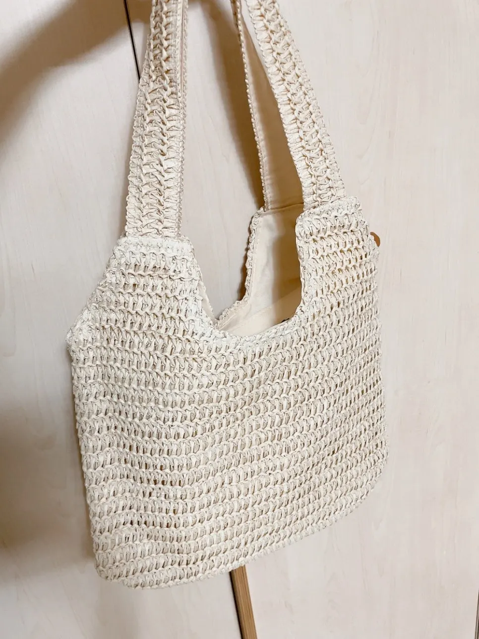 Vertical view of a Meda Bag rattan bag