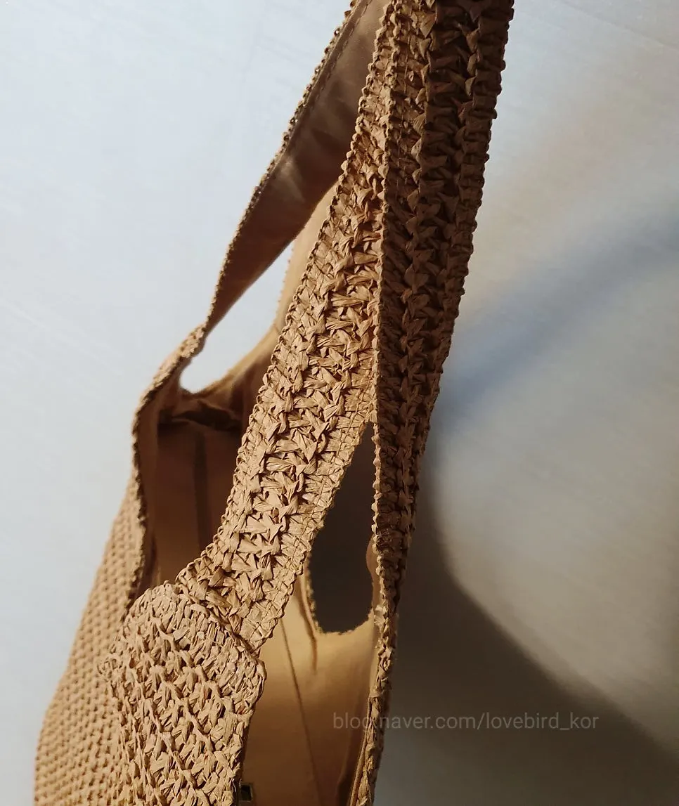 Rattan shoulder bag paired with a summer outfit