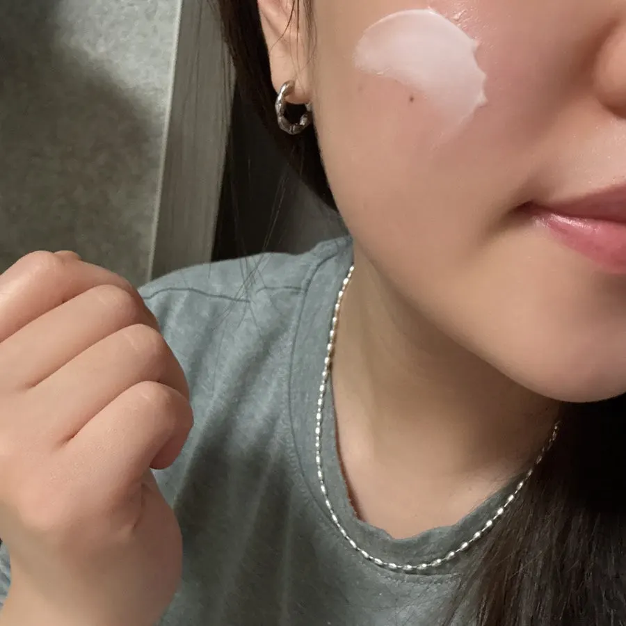 Applying cream to dry skin